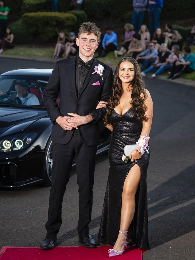 Harry Naumann and Sophie Quade arrive at Harristown State High School formal at Highfields Cultural Centre, Friday, November 18, 2022. Picture: Kevin Farmer