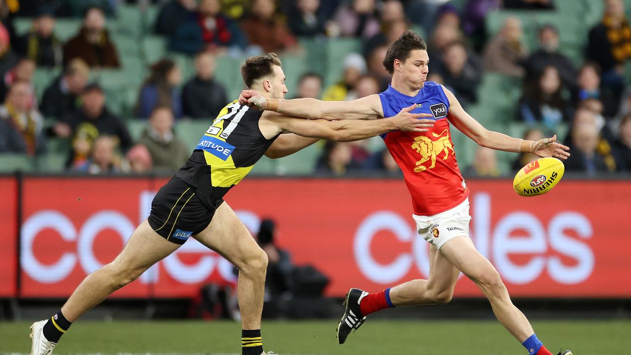 Lions forward Eric Hipwood (right) is put under pressure by Richmond’s Noah Balta. Picture: Mark Stewart