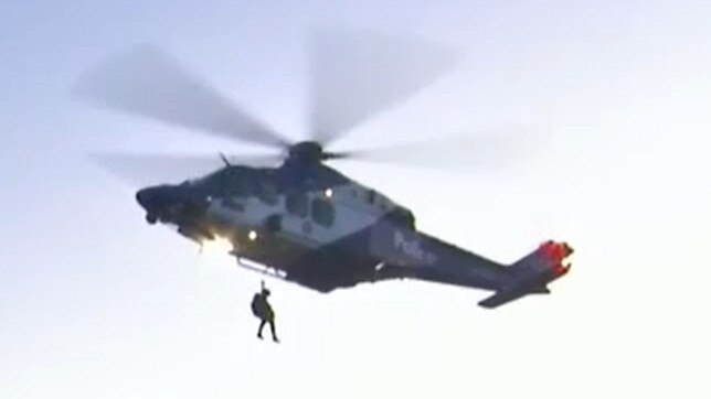 The police airwing rescued two hikers stuck on a cliff face at Werribee and kids stuck on the wrong side of a river near Glenmaggie in the one night. Picture: 9News / file