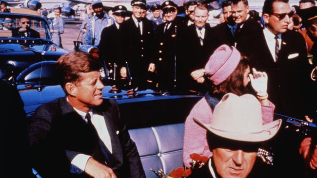 US President John F Kennedy &amp; First Lady Jacqueline Kennedy prepared for motorcade into city from airport, Nov. 22. After a few speaking stops, the President was assassinated in the same car. Picture: Getty