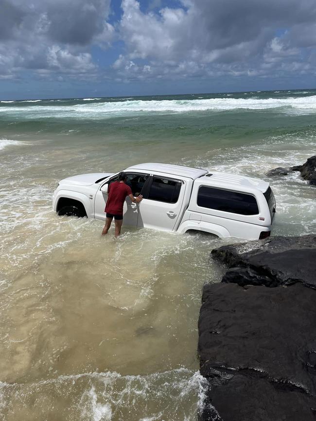 The driver of a VW Amarok lost the fight against mother nature and hydrolocked his engine after trying to jump the queue for the bypass at Ngkala Rocks on K'gari on Boxing Day.