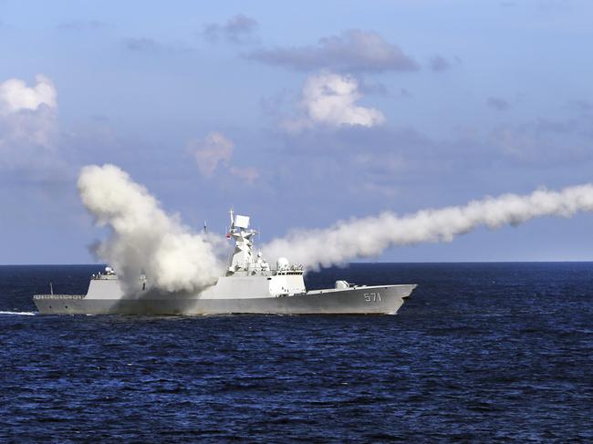 The Chinese missile frigate Yuncheng launches an anti-ship missile during a military exercise in the waters near south China's Hainan Island and Paracel Islands at the weekend. Picture: Xinhua