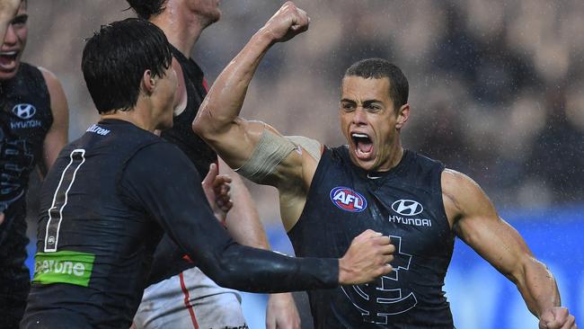 Ed Curnow is ecstatic after his last-quarter goal. Picture: AAP