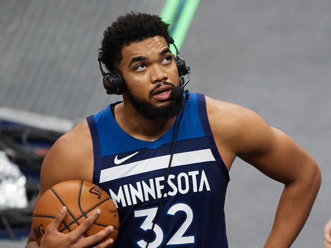 MINNEAPOLIS, MINNESOTA - DECEMBER 23: Karl-Anthony Towns #32 of the Minnesota Timberwolves does an interview after the season opening game against the Detroit Pistons at Target Center on December 23, 2020 in Minneapolis, Minnesota. The Timberwolves defeated the Pistons 111-101. NOTE TO USER: User expressly acknowledges and agrees that, by downloading and or using this Photograph, user is consenting to the terms and conditions of the Getty Images License Agreement (Photo by Hannah Foslien/Getty Images)