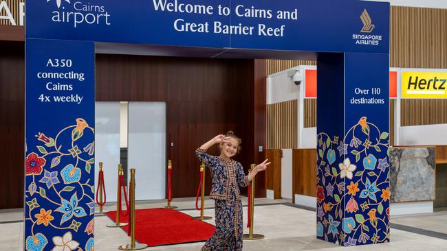 A young passenger arrives in Cairns on board Singapore Airlines new A350 service. Photo: Supplied