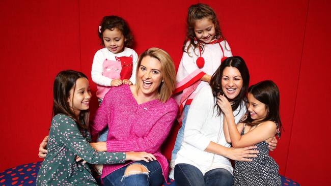 Podcasters and friends Rachel Thaiday, Katie Mattin and their children. Picture: AAP/Claudia Baxter