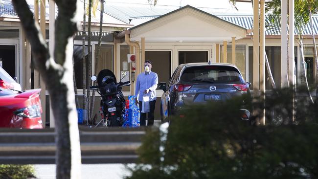 People/cleaners and relatives at Bolton Clarke Fairview Pinjarra Hills Aged Care at 2603 Moggill Rd, Pinjarra Hills, Brisbane, on Sunday. PHOTO: News Corp/Attila Csaszar