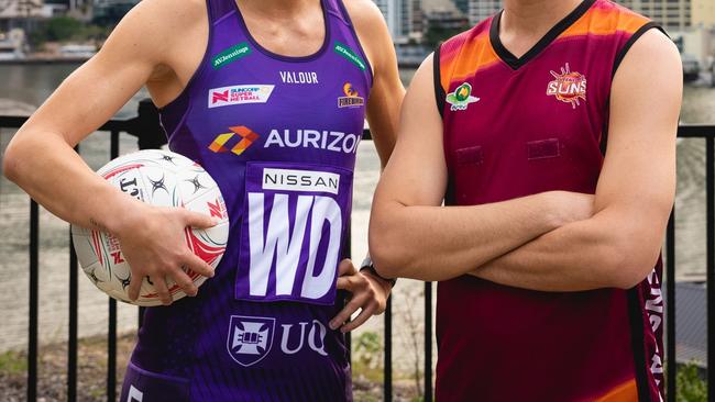 Kim Ravaillion and Glenn Ormesher pose for photo. Credit: Netball Queensland