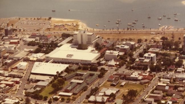 1985: Southport shows the newly completed shopping centre, before its 1989 expansion to Nerang St. Southport State School is still on the site of what is now the Southport Central tower complex.