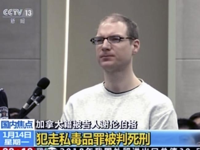 In this image taken from a video footage run by China's CCTV, Canadian Robert Lloyd Schellenberg attends his retrial at the Dalian Intermediate People's Court in Dalian, northeastern China's Liaoning province on Monday, Jan. 14, 2019. A Chinese court sentenced the Canadian man to death Monday in a sudden retrial in a drug smuggling case that is likely to escalate tensions between the countries over the arrest of a top Chinese technology executive. (CCTV via AP)