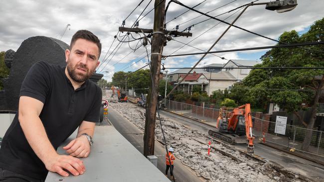 Paul Chatzis of Elephant Cafe in Flemington looks over the Mt Alexander tram works. Picture: Tony Gough