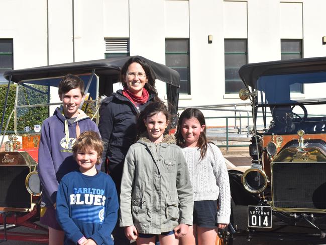 (back) Daniel, Robyn, (front) Isaac, Amelia, and Cosette Kuhn at the Jumpers and Jazz Grand Automobile Show on July 18, 2021.