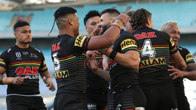 Josh Mansour celebrates a try against the Bulldogs.