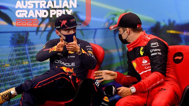 Ferrari's Charles Leclerc (R) speaks with Red Bull's Max Verstappen. Picture: AFP