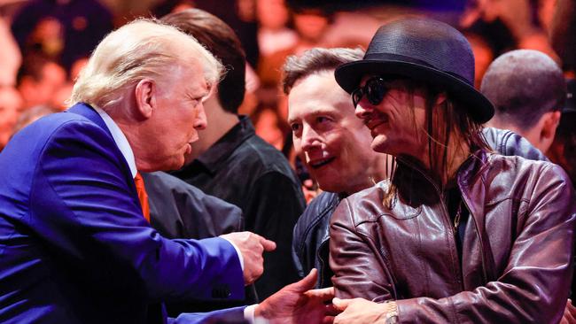 US president-elect Donald Trump talks with Elon Musk and Kid Rock at UFC 309 at Madison Square Garden. Picture: AFP