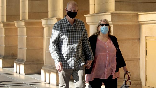 Glenda Burgess arrives at District Court with husband on Thursday. Picture: NCA NewsWire / Dean Martin