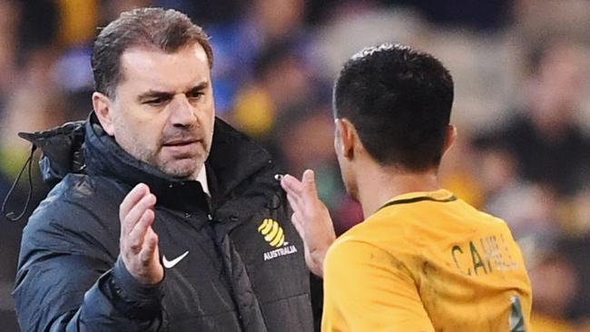 Tim Cahill of the Socceroos with Ange Postecoglou.