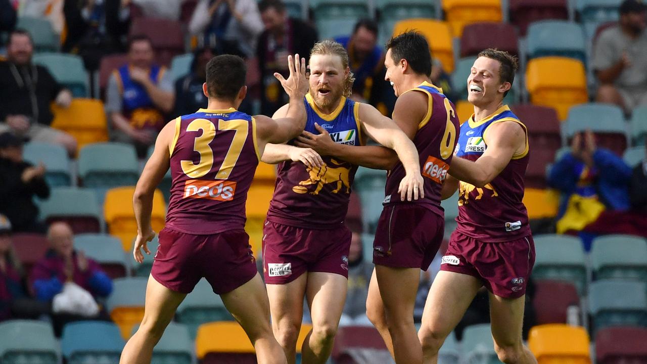 It’s team first for Lions star Daniel Rich (centre) as he prepares from time away from his family in an interstate hub. Picture: Darren England/AAP Image