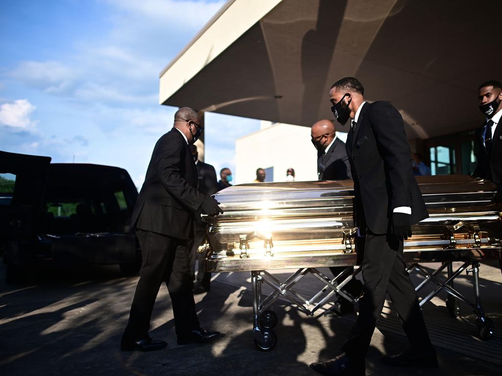 Pallbearers move the casket of George Floyd after a public viewing at the Fountain of Praise church in Houston, Texas. Picture: AFP