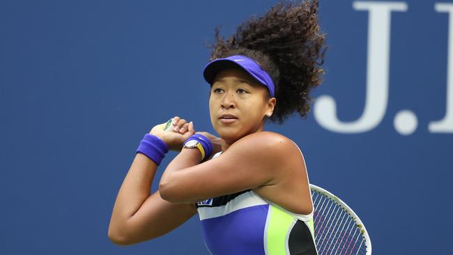 Osaka returns the ball in the second set.