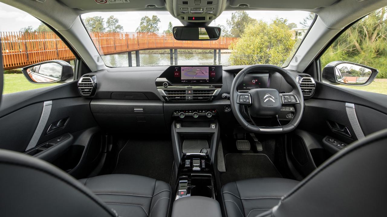 Inside the Citroen C4 Shine features a flat bottom and flat top steering wheel. It also comes with a 10-inch touchscreen boasting Apple CarPlay and Android Auto functionality, satnav, black leather seats with grey stitching and 18-inch alloy wheels.