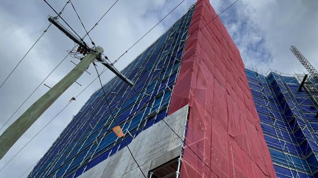 Powerlines near the Greenwich development by Ention, which was being built by Groupline Constructions. Picture: Kathleen Skene