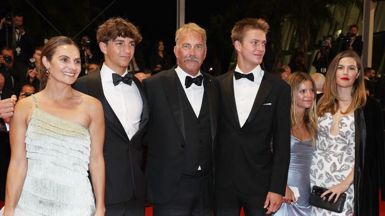 CANNES, FRANCE - MAY 19: (L-R) Annie Costner, Hayes Logan Costner, Kevin Costner, Cayden Wyatt Costner, Grace Avery Costner and Lily Costner depart the "Horizon: An American Saga" Red Carpet at the 77th annual Cannes Film Festival at Palais des Festivals on May 19, 2024 in Cannes, France. (Photo by Pascal Le Segretain/Getty Images)