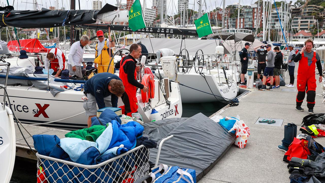 The crew of Patrice Six at the Cruising Yacht Club of Australia after pulling out of the race. Pic: Justin Lloyd.