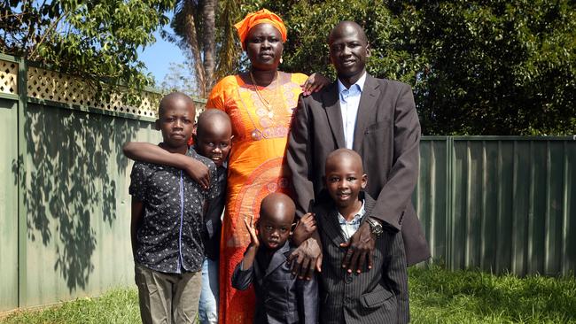 01/01/2017: Majok Tulba with his wife Mary and their four children,  (left to right) Marial, 8, Aleec,9, ,Maker, 4,and Tulba,5, at home in western Sydney. Pic by James Croucher