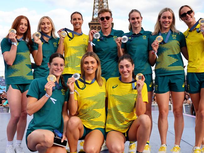 PARIS, FRANCE - AUGUST 07: Team Australia swimming medalists pose for a photo with their medals on day twelve of the Olympic Games Paris 2024 at Champions Park on August 07, 2024 in Paris, France. (Photo by Michael Reaves/Getty Images)