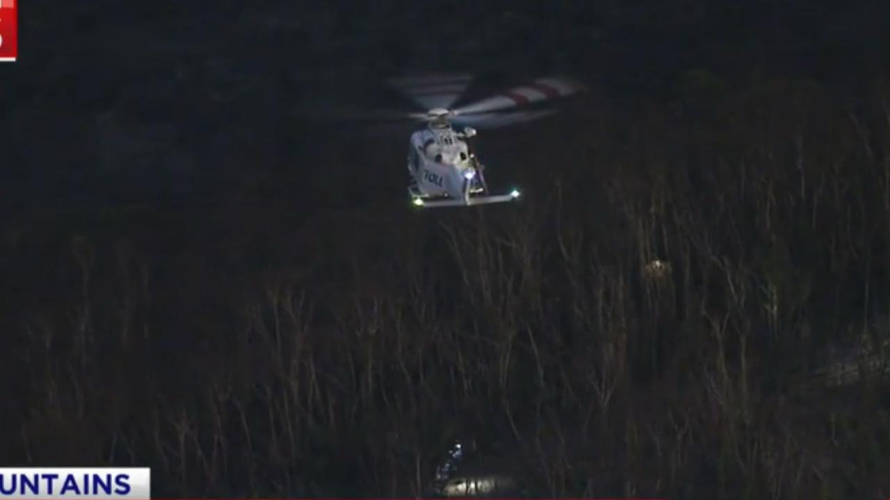 Police attempted to rescue the man last night but were hampered by conditions. Picture: 7 News