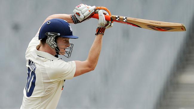 Alex Keath plays a drive for Victoria against England in 2010.