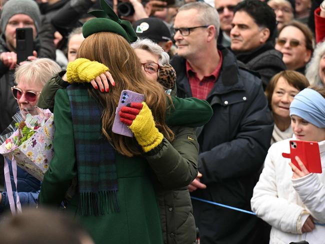 Catherine, Princess of Wales is hugged by a wellwisher after attending the traditional Christmas Day service at St Mary Magdalene Church. Picture: AFP