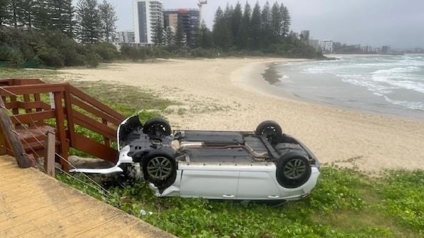 Car rolled onto Snapper Rocks beach in Coolangatta. Photo: Friends of Rainbow Bay Society/Facebook