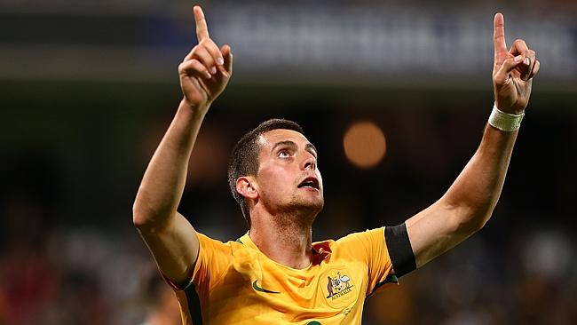 Tom Juric celebrates scoring.