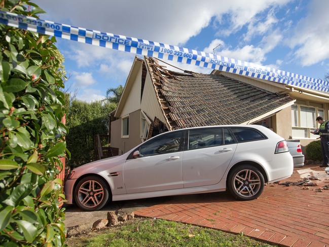 A BMW ploughed into a home in Viewbank last night, with the driver fleeing the scene. Crime Scene Police on scene in Ulrich Court. Picture: Sarah Matray