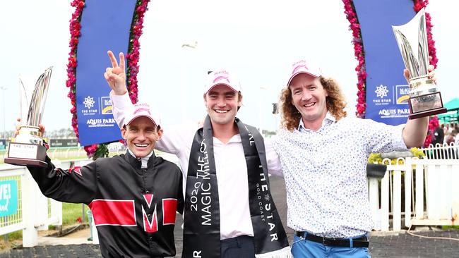 Jockey Luke Currie celebrates Away Game’s Magic Millions win with co trainers David Eustace and Ciaron Maher. Pic: AAP