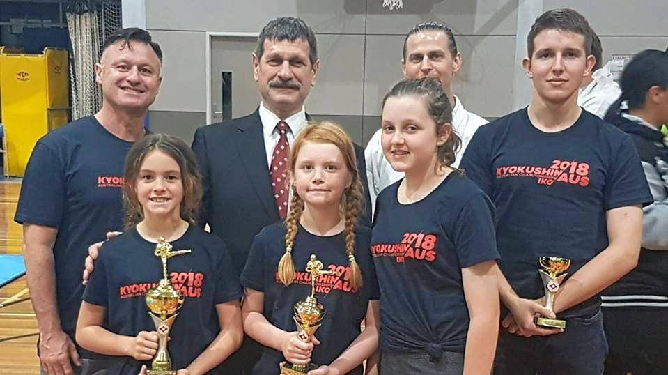 Toowoomba Kyokushin Karate Club members (from back, left) head instructor Drew Camm, Kyokushin Karate South Pacific region chairman Nic Cujic, Damien Herde, Samuel Hayes, (front from left) Ellen Camm, Rose Cook and Lily Hayes at the Kyokushin Australian Championships. Picture: Contributed