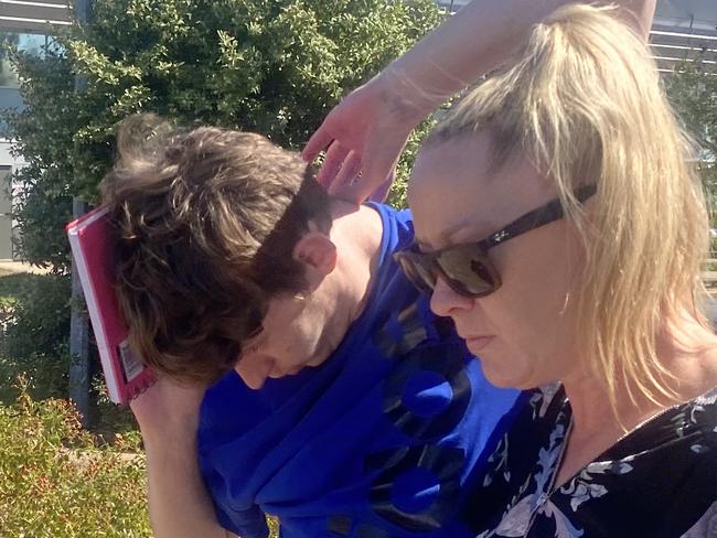 Alleged Munno Para stabber Jasper Kidd with his mother outside the Elizabeth Magistrates Court. Picture: Brinley Duggan