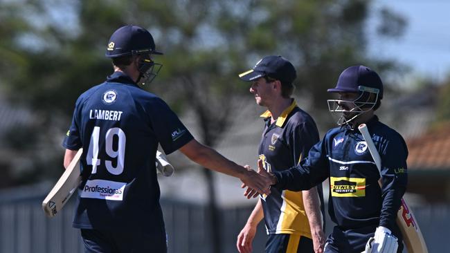 Hoppers Crossing’s Simon Lambert and Shijit Chandran during shaking hands after their win over Balwyn in round 10 last game. Picture: Andy Brownbill