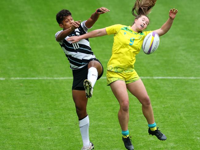 Sesenieli Donu battles for possession with Tia Hinds in Fiji’s 19-0 win. Picture: Richard Heathcoteiji/Getty Images