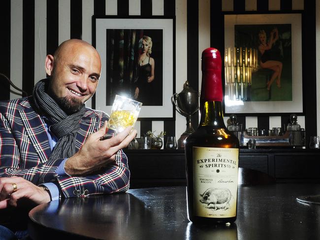 Sven Almenning with a glass of the Experimental Spirits Co. Smoked Bacon Bourbon, at the Roosevelt. Picture: John Appleyard