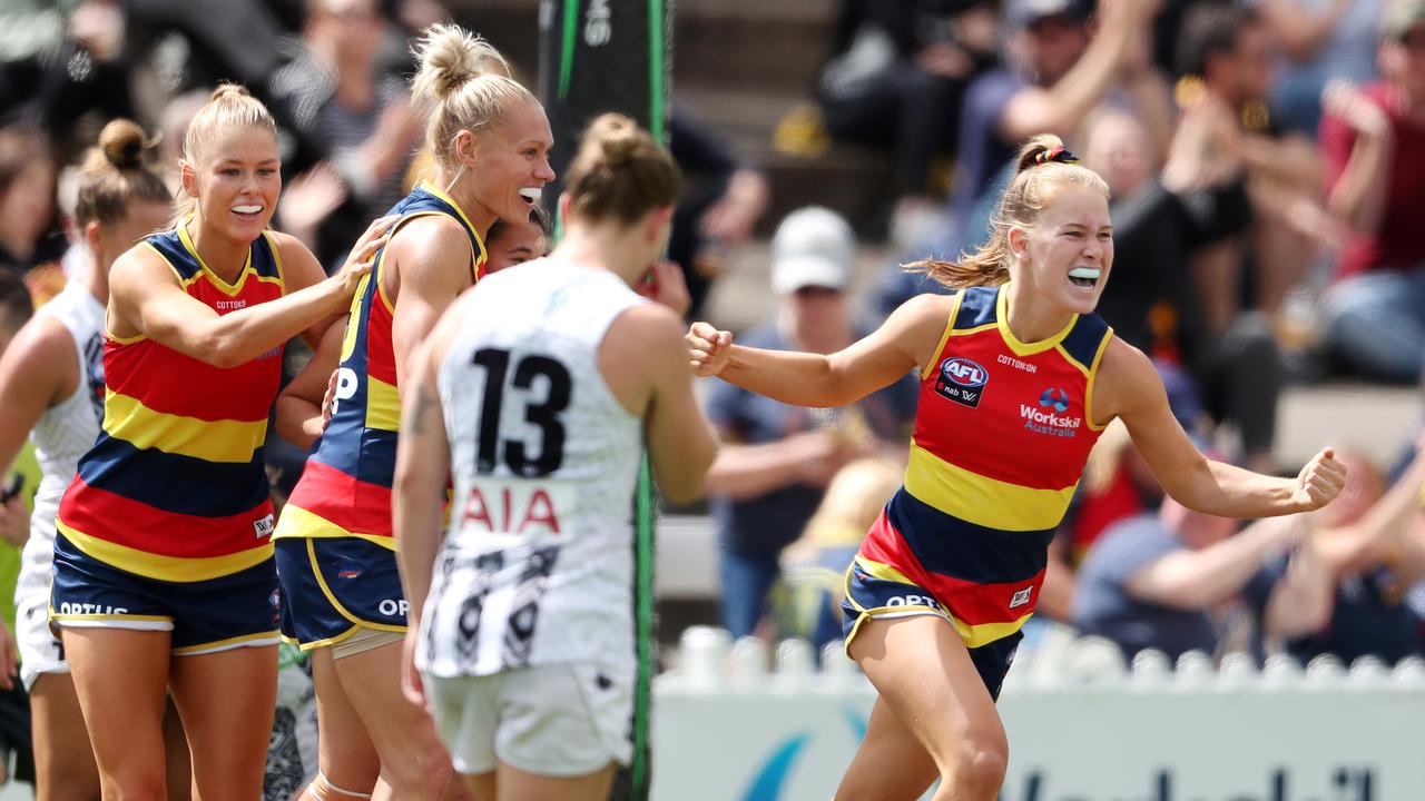 Teah Charlton celebrates a goal for Adelaide against Collingwood. Picture: Sarah Reed/AFL Photos via Getty Images