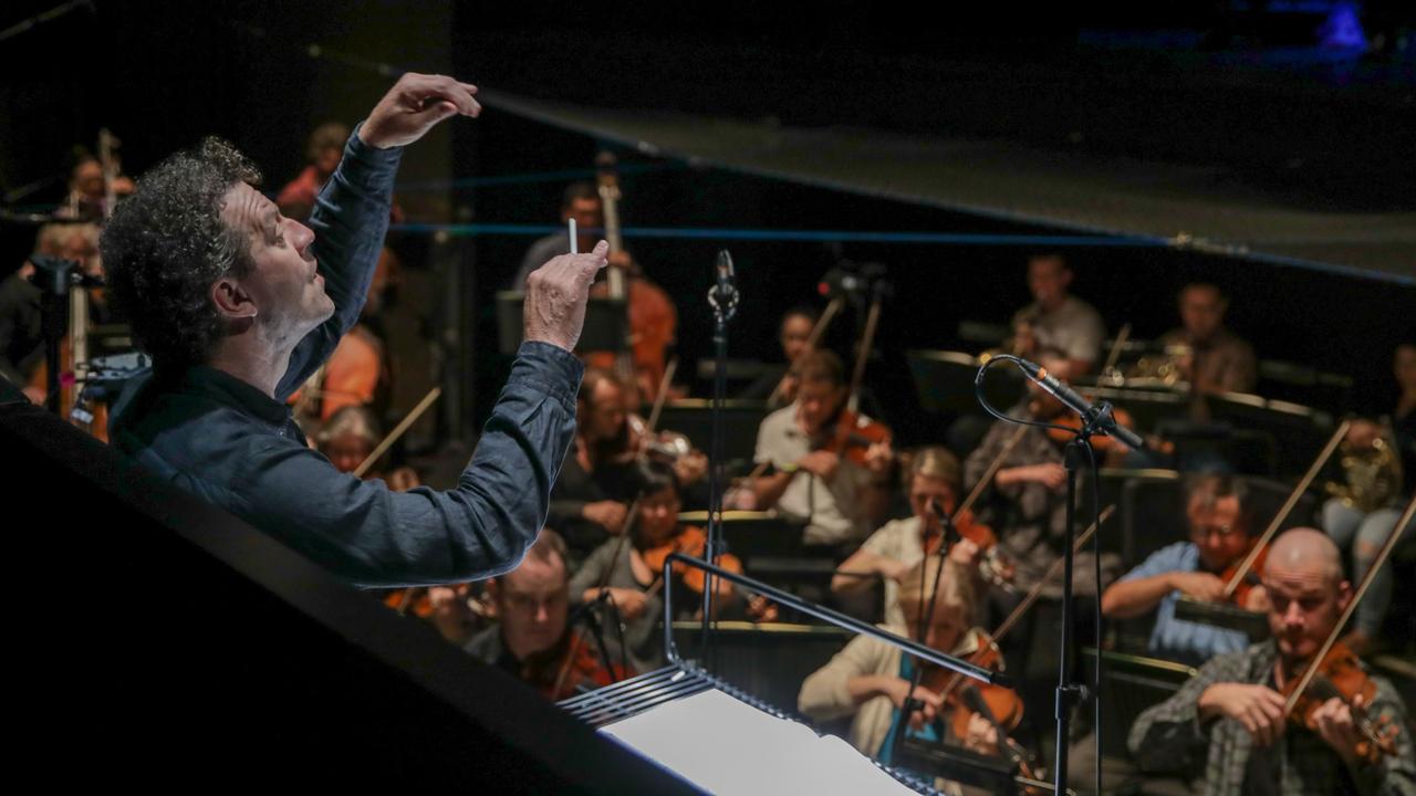 Brett Weymark conducts the Adelaide Symphony Orchestra and choir in A Child of Our Time at the Adelaide Festival 2021. Picture: Tim Standing