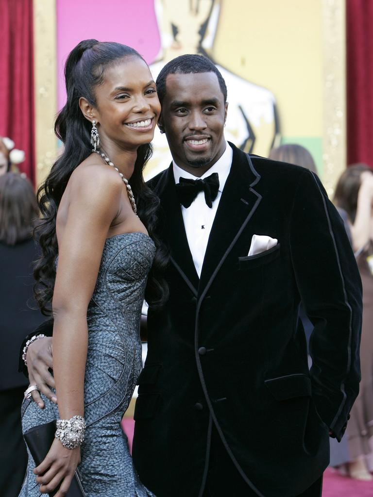 The hip-hop mogul with his then girlfriend Kim Porter, the mother of three of his children, in 2005. Picture: AP