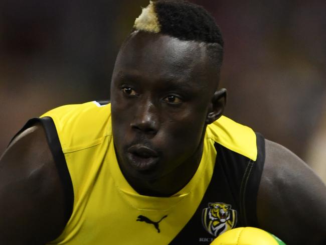 Mabior Chol of the Tigers is seen in action during the Round 15 AFL match between the St Kilda Saints and the Richmond Tigers at Marvel Stadium in Melbourne, Sunday, June 30, 2019. (AAP Image/Julian Smith) NO ARCHIVING, EDITORIAL USE ONLY