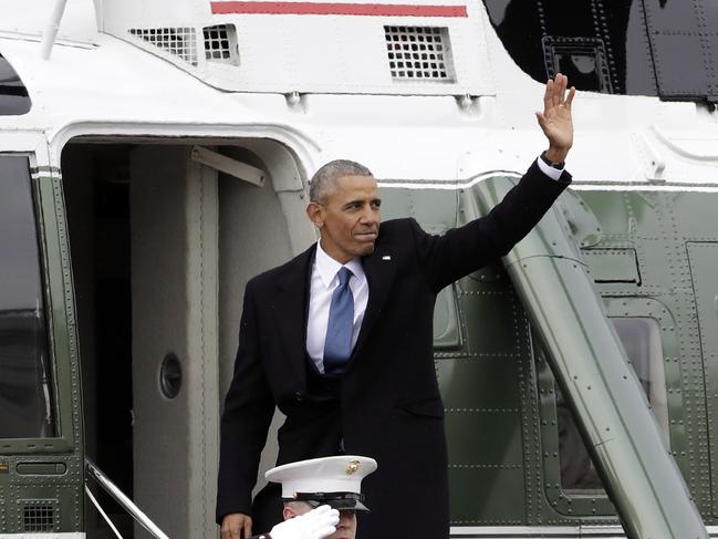 Former President Barack Obama waves as he boards a Marine helicopter during a departure ceremony on the East Front of the U.S. Capitol in Washington on January 20, 2017, after President Donald Trump was inaugurated. Picture: AP