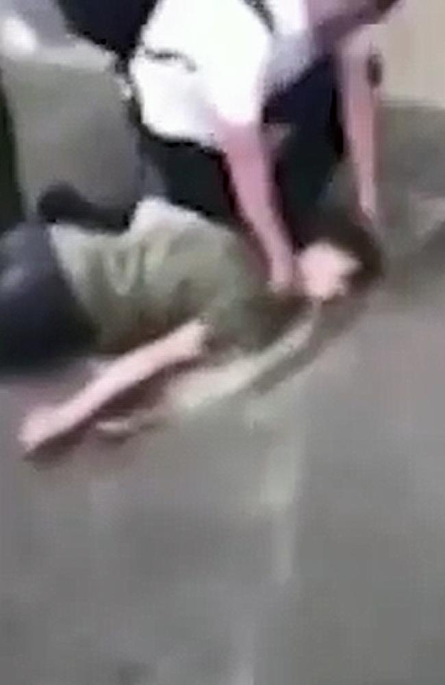 After being punched, the boy falls heavily on the ground and lays still. Picture: Seven News