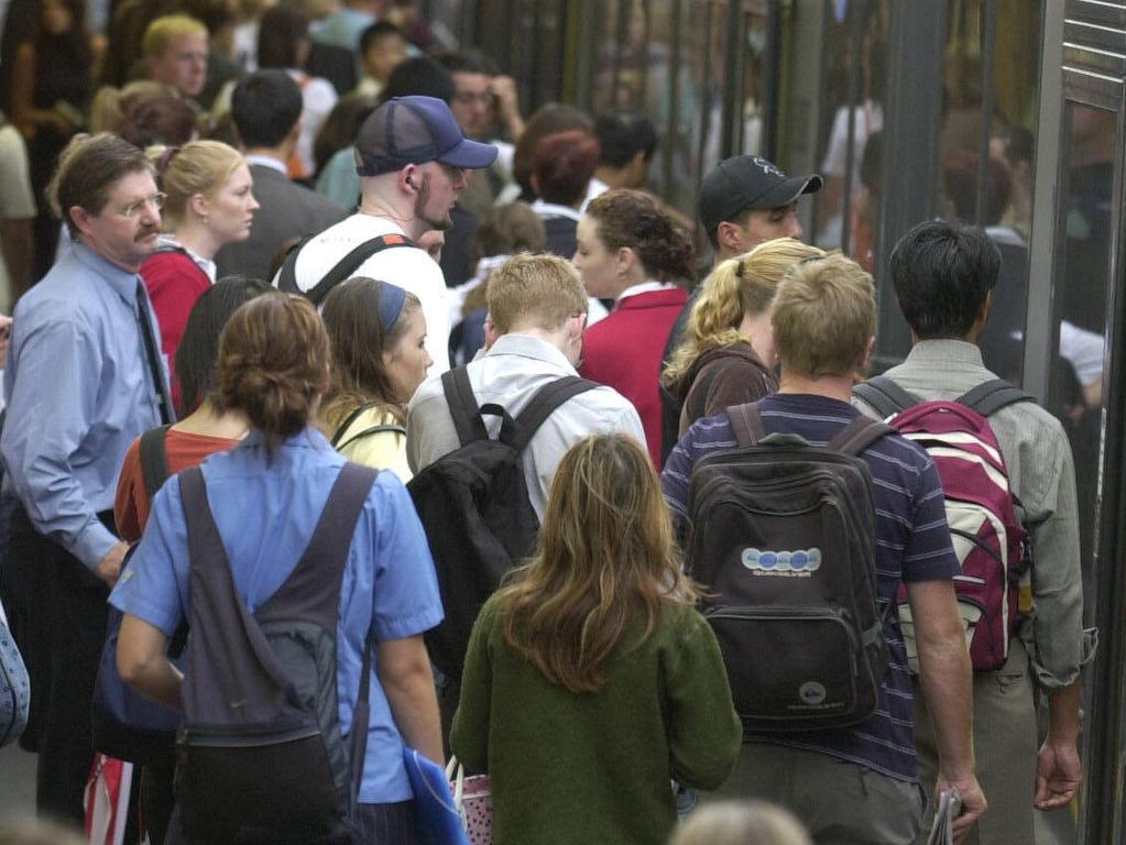 A crowd of train commuters during peak hour at Redfern in Sydney. Picture: John Grainger. NSW / Commuter