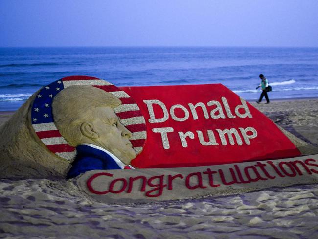 A sculpture made by Indian sand artist Sudarsan Pattnaik depicting former US president and Republican presidential candidate Donald Trump after he won a sweeping victory in the US presidential election in Puri of India's Odisha state on November 6, 2024. Indian Prime Minister Narendra Modi congratulated Donald Trump for a "historic election victory" on November 6, adding that he was looking forward to working with the vote frontrunner. (Photo by AFP)